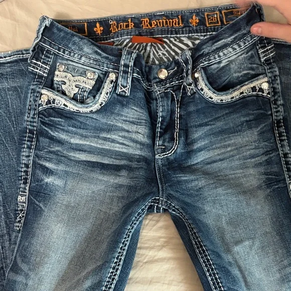 Rock Revival Blue Boot Cut Jeans with Embellished Pockets